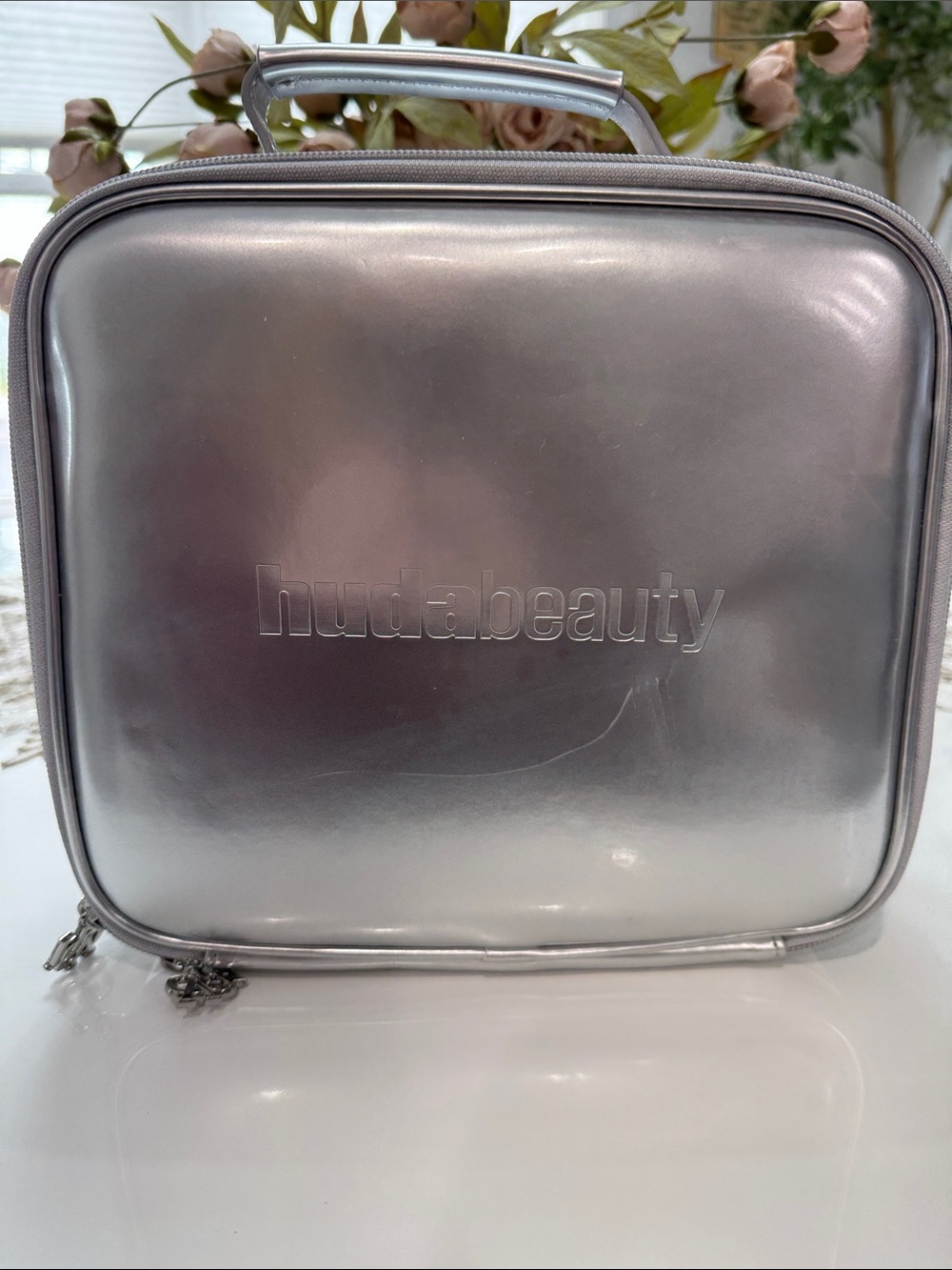 HUDA BEAUTY Silver Metallic makeup bag